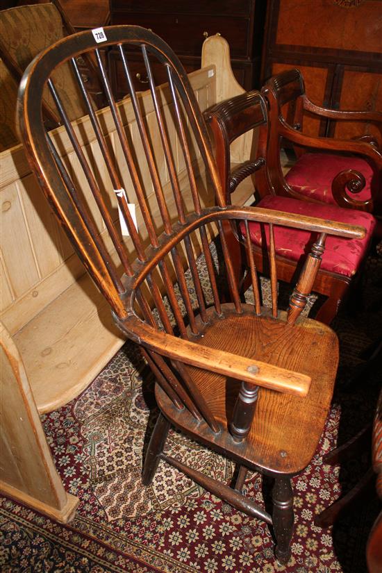 A 19th century elm seat Windsor armchair,